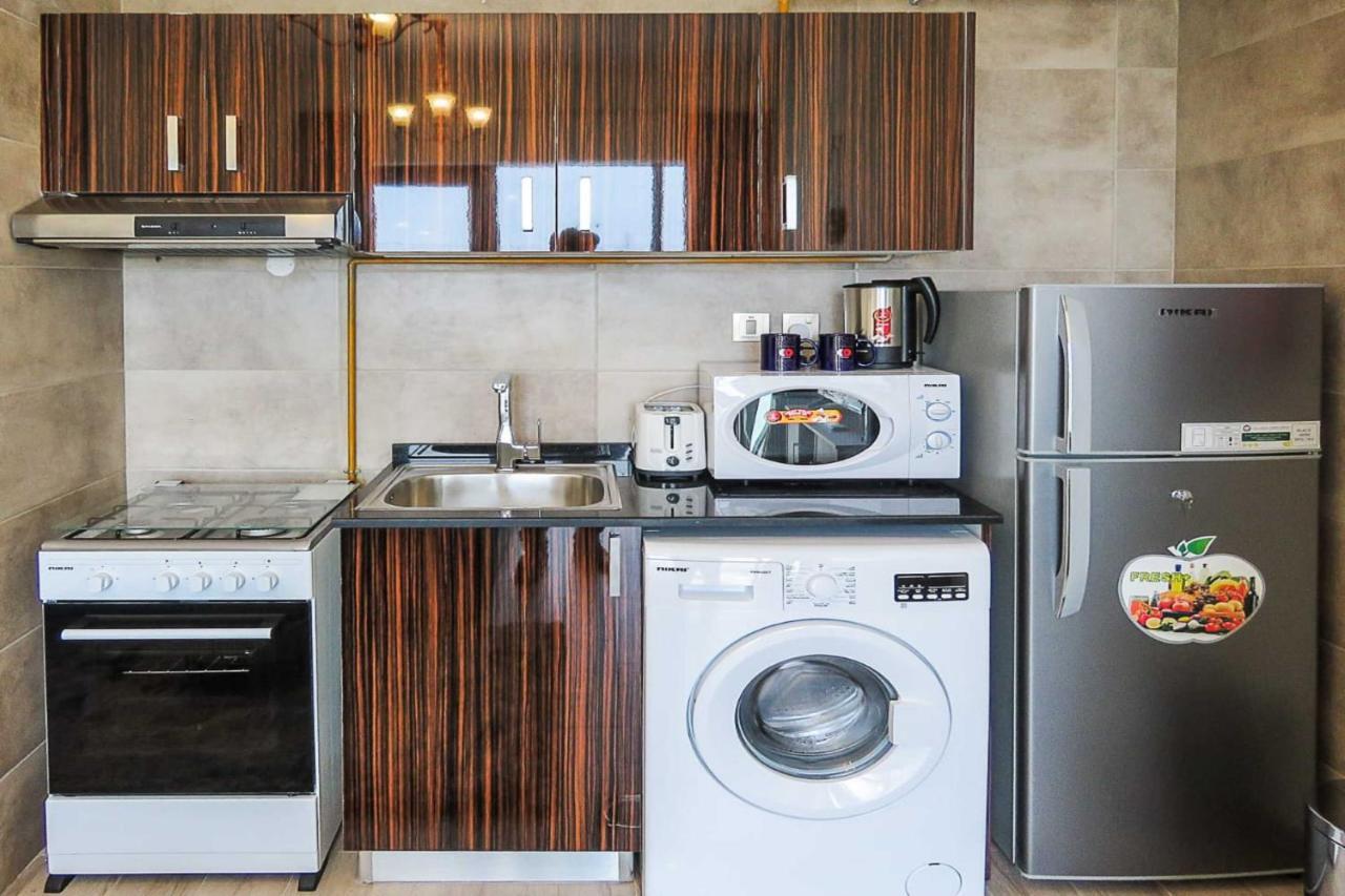 Oyo 860 Studio Apartment, Maya Tower 4, Jumeirah Village Triangle Дубай Екстер'єр фото