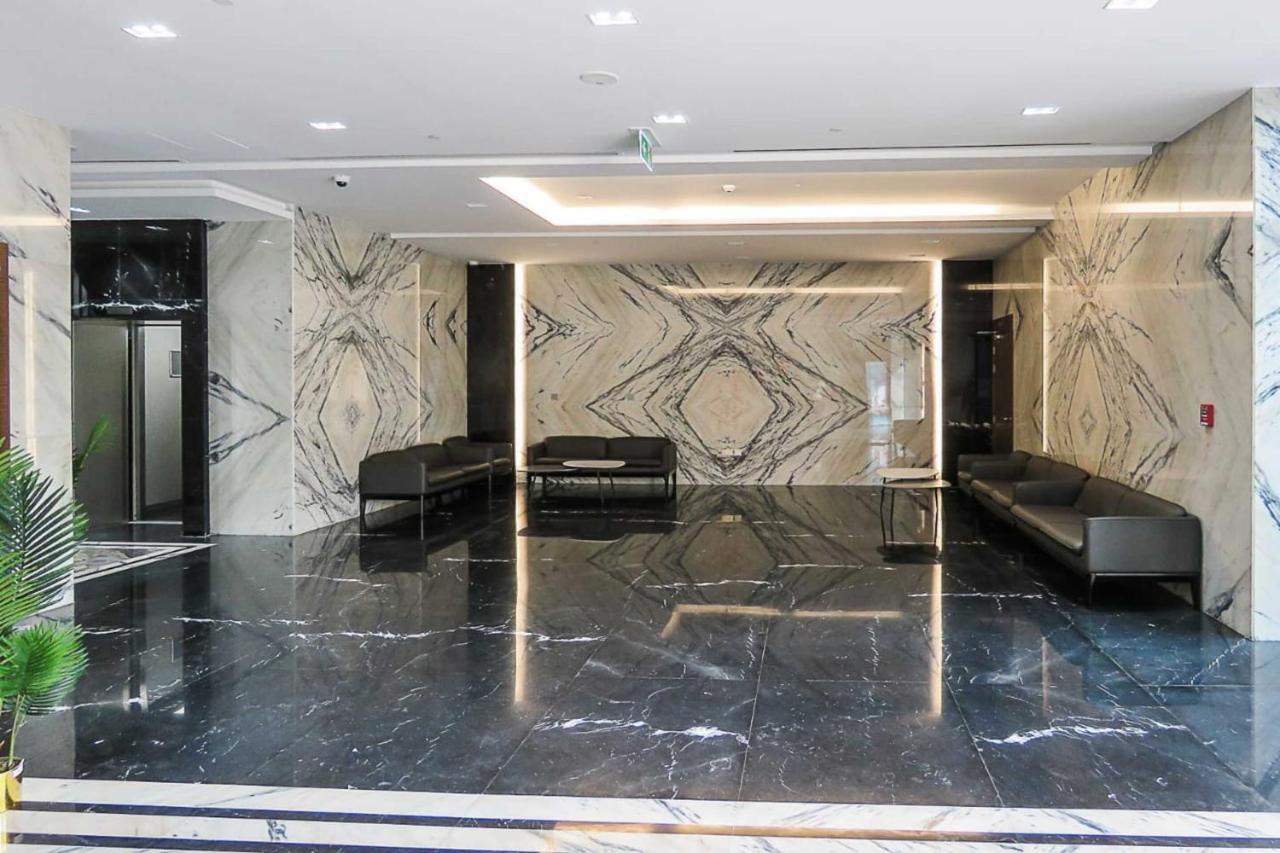 Oyo 860 Studio Apartment, Maya Tower 4, Jumeirah Village Triangle Дубай Екстер'єр фото