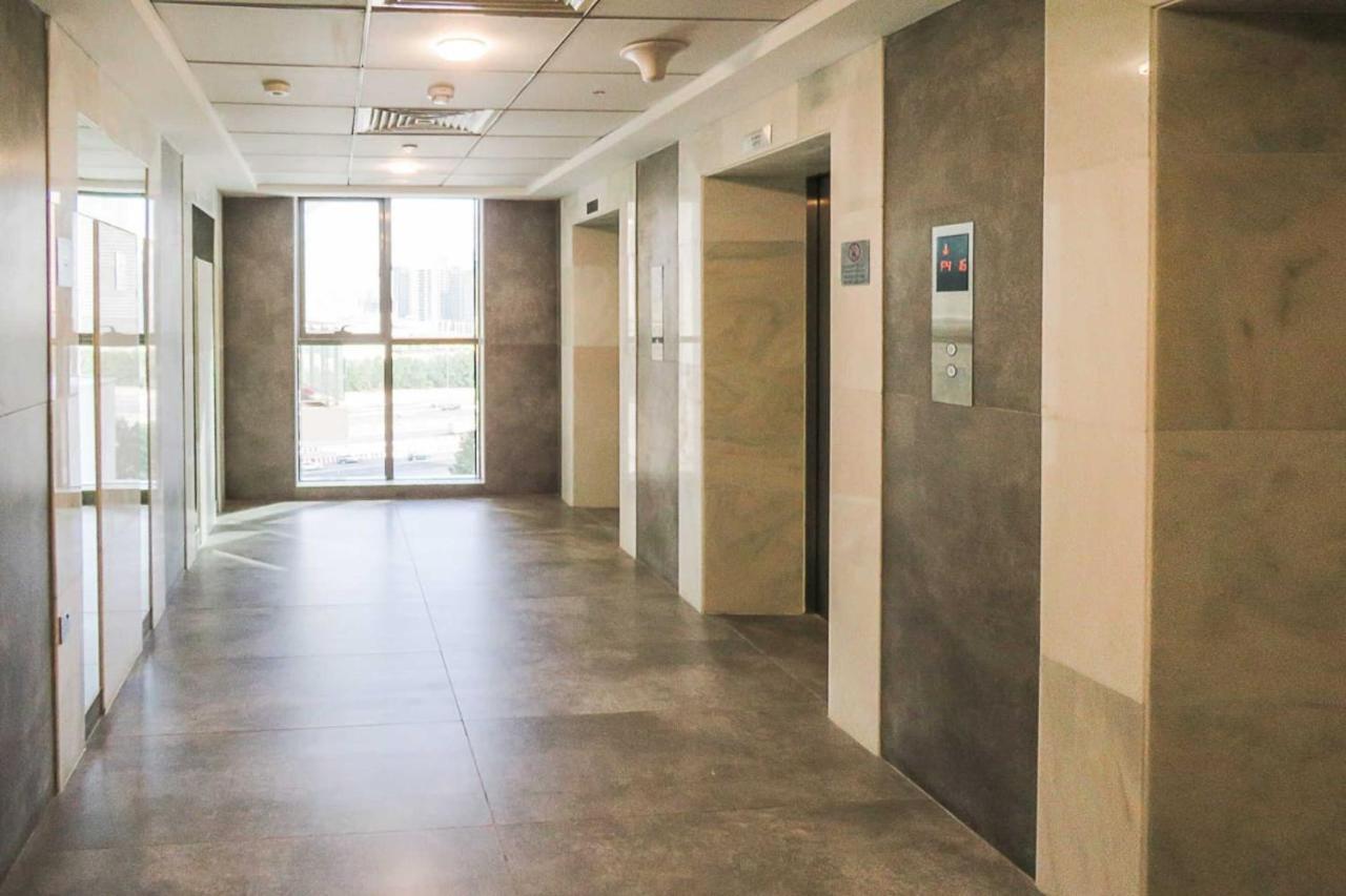 Oyo 860 Studio Apartment, Maya Tower 4, Jumeirah Village Triangle Дубай Екстер'єр фото